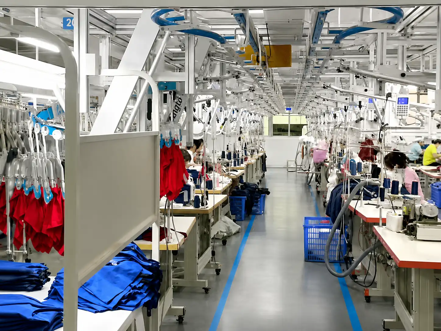 Automated garment hanging system supporting an organized activewear production workflow